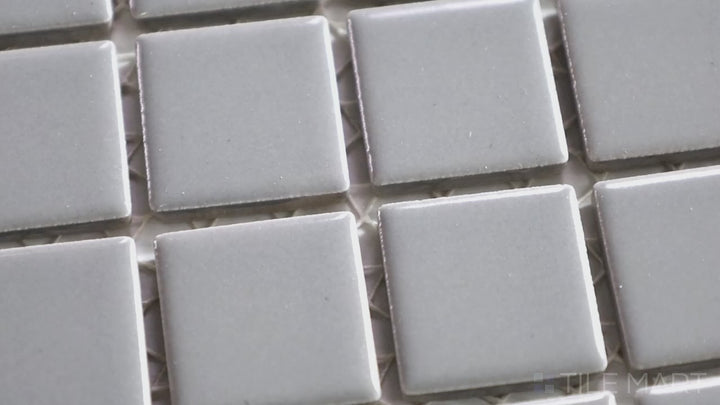 Video of Porcelain Glazed Mosaics Gray 1-inch Square Matte. A modern gray matte porcelain square mosaic with a soft, structured look, ideal for sleek and minimalist spaces.
