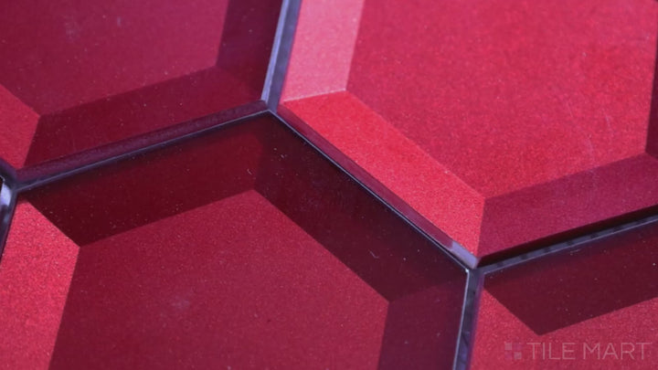 Video showcasing Bold Glass Red 3-inch Hexagon Glossy Mosaic. With a bold red hue and a reflective glossy surface, this hexagon-shaped tile makes a vibrant statement with its sleek glass texture.