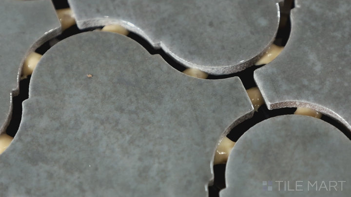 Video highlighting Mesmerist Charm Arabesque Glossy Glazed Ceramic Mosaic. A beautiful arabesque tile with a high-gloss finish, perfect for sophisticated interiors.