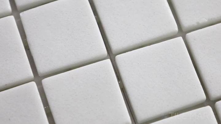 Video of Natureglass Malla White 1-inch Square Matte Glass Mosaic. A bright white matte glass mosaic with a soft finish, enhancing brightness with a clean and crisp look.