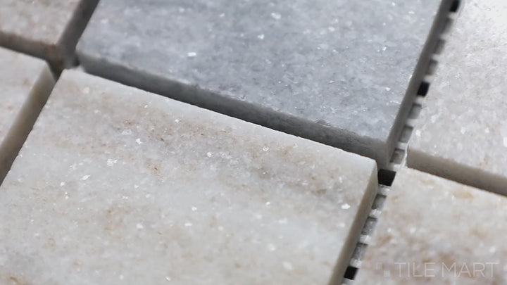 Video featuring Sto-Re Ocean White 2.25" Square Polished Marble Mosaic. A refined Ocean White marble mosaic with a polished finish, composed of large square tiles for a clean, modern look.