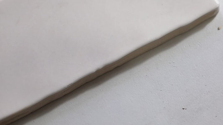 Video showcasing Vitral Bianco 3X12 Glossy Ceramic Tile. A crisp white glossy ceramic tile, ideal for clean, modern backsplash designs.