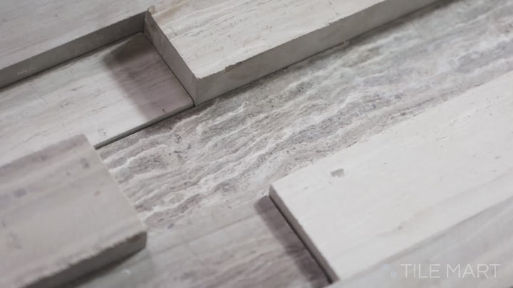 Video highlighting Rockmount Gray Oak 6X24 Stacked Stone Panel Honed Marble. A sleek honed marble stacked stone with soft gray tones, ideal for modern designs.