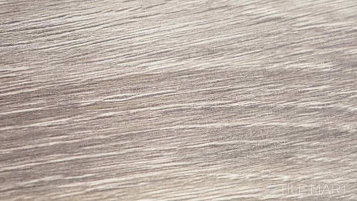 Video of Cyrus Cranton 7X48 Low Gloss Luxury Plank Vinyl. A classic wood-look luxury vinyl plank with a rich brown finish and elegant matte texture.