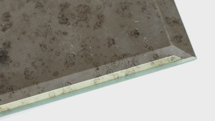 Video of Lavaliere Calacatta Gold Windblown Honed Mosaic. A soft yet elegant honed mosaic with golden Calacatta accents, bringing a natural, high-end feel to any room.