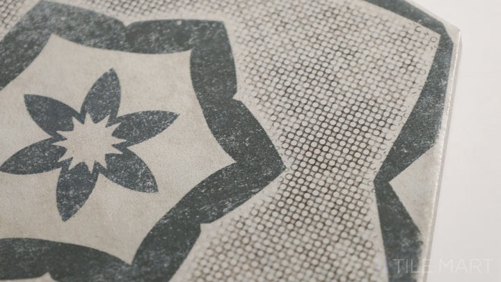 Video of Eden Cotone Decoro Tappeto 8" Hex Matte Porcelain. A beautifully patterned hex tile with intricate designs, bringing vintage charm to any space.