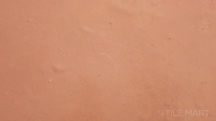 Video of Saltillo Salmon 8-inch Hex Natural Terracotta. A hexagonal terracotta tile with a handcrafted texture, blending classic charm with a modern geometric shape.