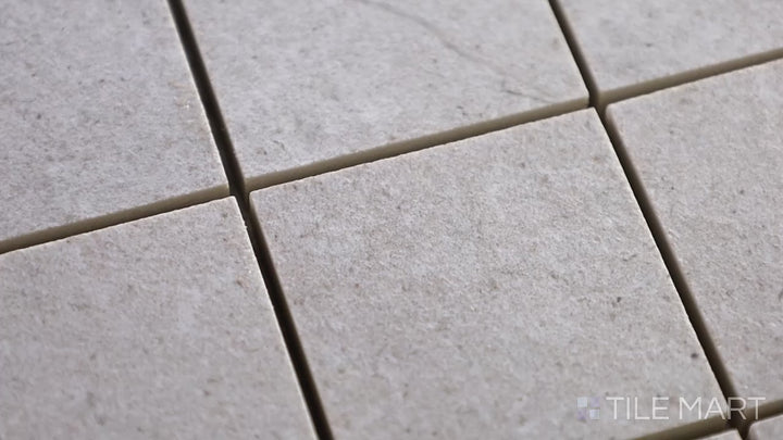 Video featuring Epika Pearl 2-inch Square Matte Porcelain Mosaic. A delicate pearl porcelain mosaic with a matte finish, offering a timeless and sophisticated appeal.