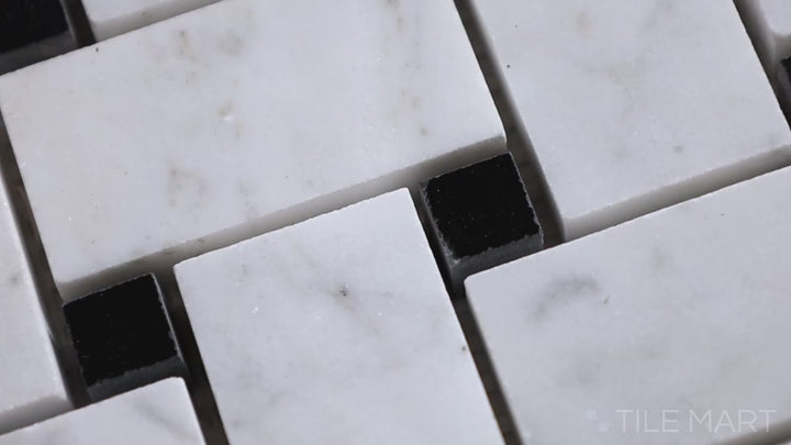Video showcasing Sto-Re Carrara W/ Black Dot Basketweave Polished Marble Mosaic. A polished Carrara marble mosaic with a basketweave layout and striking black dot accents.