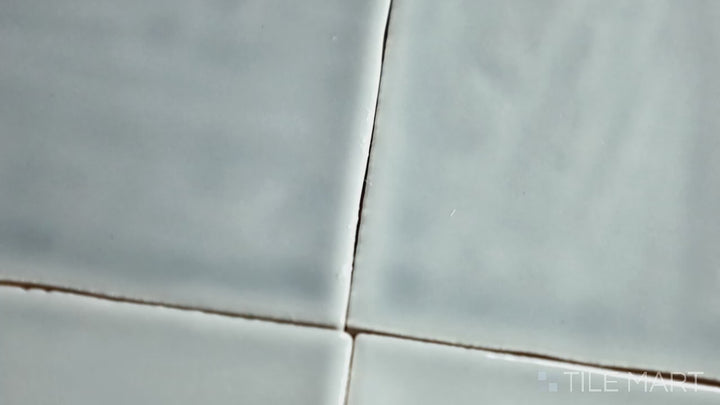 Video featuring Marin Misty Blue 4X4 Gloss Glazed Ceramic. A soft blue glossy tile with a polished finish, perfect for airy, coastal-inspired interiors.