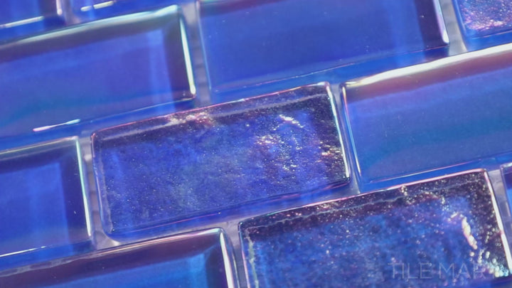 Video showcasing Vidrofina Cobalt Blue Brick Glossy Glass Mosaic. A striking blue glass mosaic in a classic brick pattern, adding dynamic movement to walls and backsplashes.