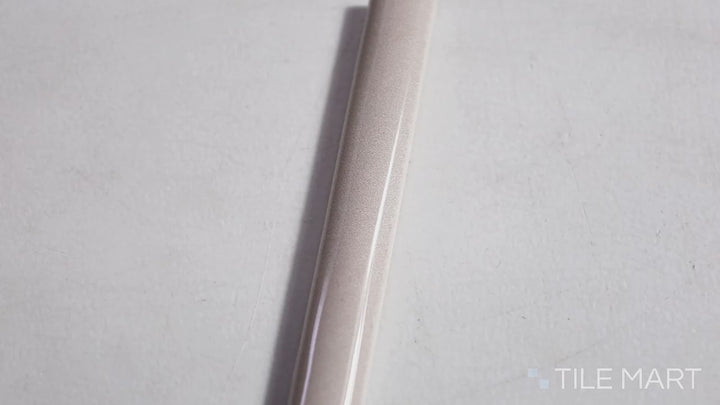 Video highlighting Safi Nude 0.41x6 Glossy Ceramic Pencil. A warm nude glossy ceramic pencil tile, perfect for elegant trims and borders.