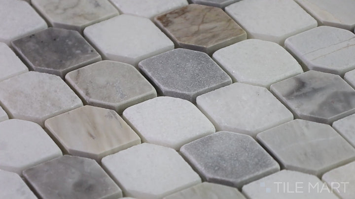 Video showcasing The Finish Line Natural Hexagon Polished Marble Mosaic. A timeless hexagonal marble tile with a polished finish, perfect for modern and classic interiors.