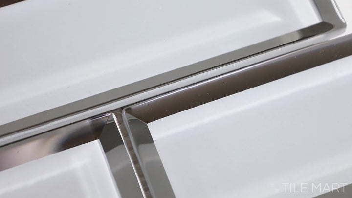 Video highlighting Modern Glass Grey Brick Glossy Mosaic. This neutral grey glass mosaic features a high-gloss finish and classic brick pattern for a timeless and elegant appeal.