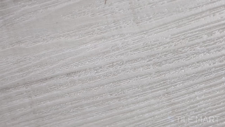 Video highlighting Andover Whitby White 7X48 Low Gloss Luxury Plank Vinyl. A sleek, whitewashed luxury vinyl plank that brings brightness and elegance to any interior space.