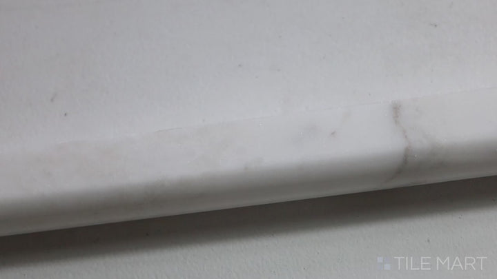 Video of Sto-Re Volakas 0.75X12 Polished Marble Pencil. A refined Volakas marble pencil tile with a polished sheen, perfect for detailed borders.