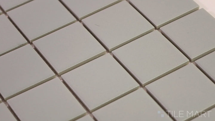 Video featuring Marin Pearl White 2" Square Matte Glazed Porcelain Mosaic. A crisp white square tile with a refined matte finish, ideal for brightening up any space.