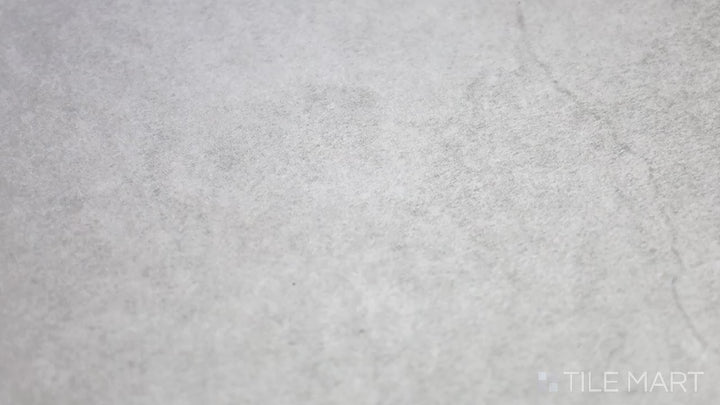 Video of Concrete Gray 48x48 Matte Porcelain. A classic gray porcelain tile with a smooth matte finish, providing a modern and versatile concrete aesthetic.
