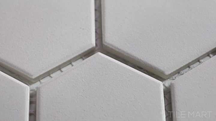 Video showcasing Solids White 2-inch Hexagon Matte Porcelain Mosaic. A bright white matte porcelain hexagonal mosaic, offering a clean and stylish design.
