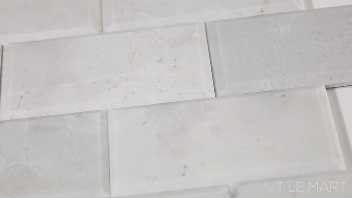Video showcasing Simplystick Mosaix Stormy Mist Honed Marble, Limestone Mosaic. A sleek, honed grey marble mosaic offering a modern, understated elegance.