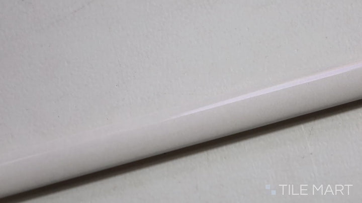 Video highlighting Village White 0.5X8 Glossy Ceramic Jolly Trim. A clean white trim tile with a high-gloss finish, perfect for crisp, refined accents.