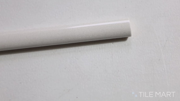 Video of Safi White 0.41x6 Glossy Ceramic Pencil. A classic white glossy ceramic pencil tile, delivering a polished and refined accent.