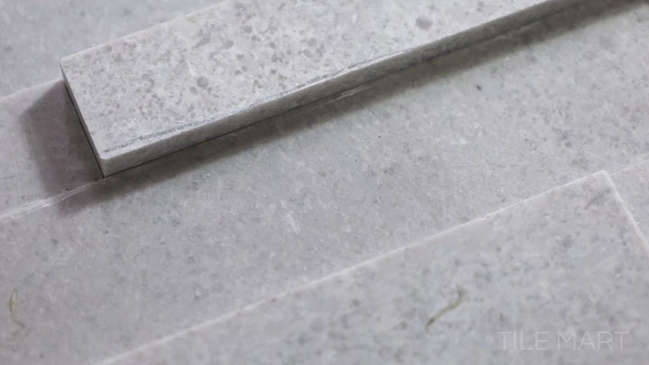 Video showcasing Modern Ledgestone Milano Grey 6x24 Porcelain. A sophisticated grey ledgestone porcelain tile with a structured finish, blending industrial and natural aesthetics.