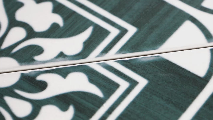 Video showcasing Andratx Telmo Green 6x6 Glossy Porcelain. A bold green glossy porcelain tile with a polished sheen, enhancing spaces with its rich color and smooth design.