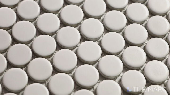 Video showcasing 360° White 3/4" Penny Round Matte Glazed Porcelain Mosaic. A soft matte white penny round tile for a subtle, refined aesthetic.