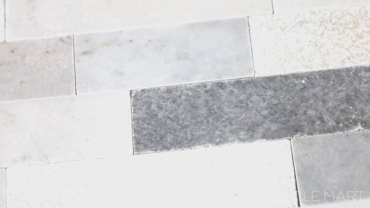 Video highlighting Minute Mosaix Stormy Mist Random Linear Marble, Limestone Mosaic. A sleek random linear mosaic with soft grey hues, perfect for modern interiors.