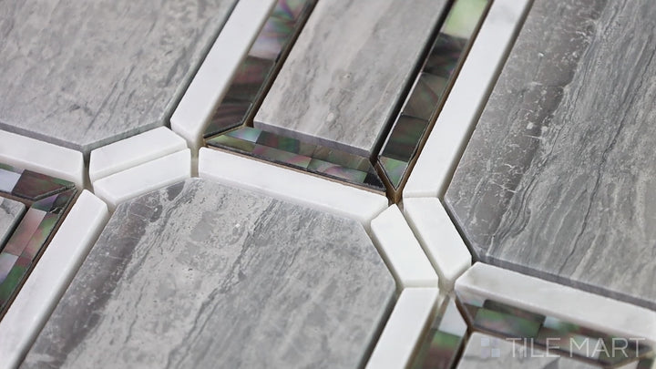 Video featuring D-Lux Pearl Pearl White Avignon Polished Shell Marble Mosaic. A luminous white shell and marble mosaic with an intricate design, perfect for modern and classic interiors.