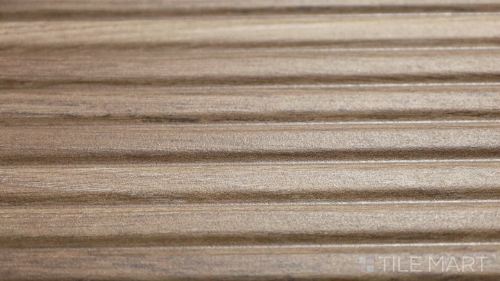 Video showcasing Ribbon Wood Walnut 12.4X39.4 Matte Ceramic. A deep walnut-toned ceramic tile that mimics real wood, perfect for elegant and inviting interiors.