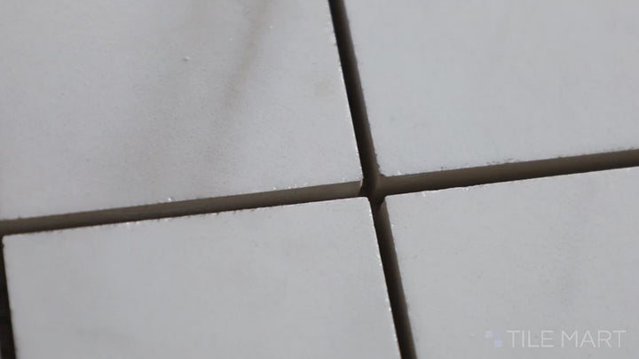Video featuring Tele Di Marmo Reloaded Calacatta 2" Square Polished Porcelain Mosaic. A classic white marble-effect mosaic tile with a polished finish for a sleek, luxurious touch.