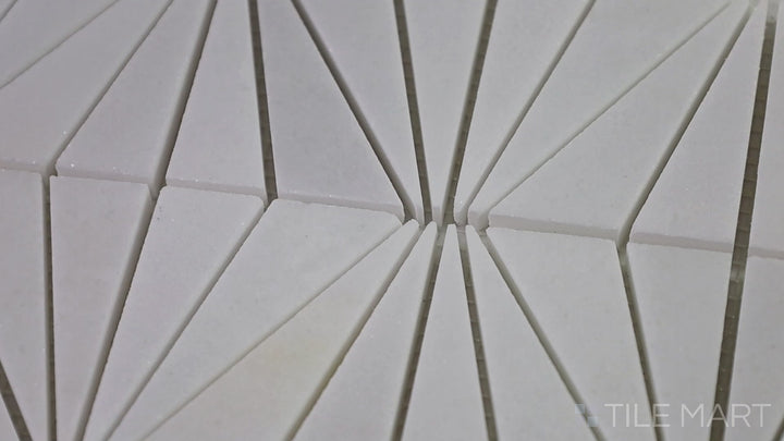 Video showcasing The Finish Line Regency White Diamond Polished Marble Mosaic. A refined white marble tile with a diamond pattern, offering a luxurious and sophisticated design.