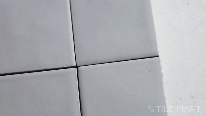 Video showcasing Kasbah Taco Amber Grey 1X1 Matte Porcelain Tile. A soft amber-grey tile perfect for detailed mosaic applications with a natural, aged appearance.