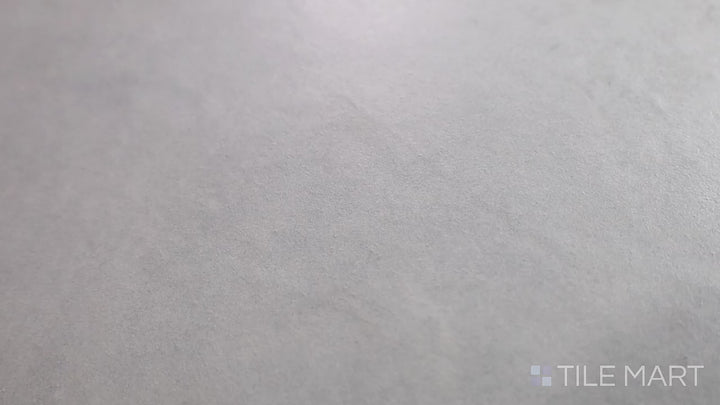 Video featuring Creos Dorian 12x24 Matte Porcelain. A sophisticated gray porcelain tile with a matte surface, blending contemporary style with a subtle texture.