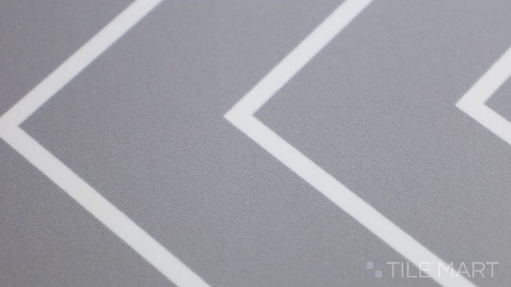 Video featuring Studio Grey With White 8X8 Matte Porcelain Tile. A muted grey tile with gentle white detailing, adding understated elegance.