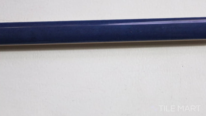 Video highlighting Village Royal Blue 0.5X8 Glossy Ceramic Jolly Trim. A deep blue trim tile with a glossy sheen, perfect for rich, bold accents.