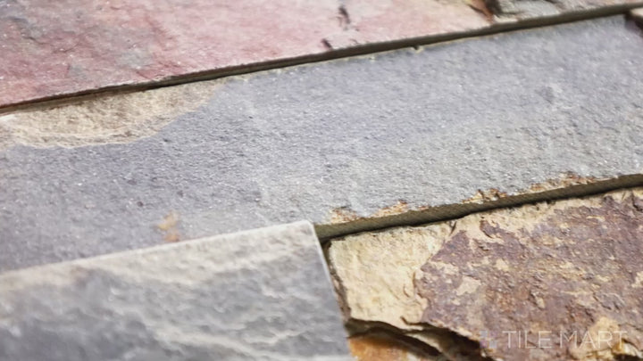 Video highlighting Rockmount California Gold 6X24 Stacked Stone Panel Splitface Slate. A warm multicolored slate panel, perfect for adding depth and texture to any design.