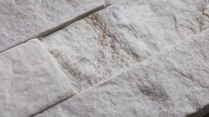 Video of Rockmount White 6X24 Stacked Stone Panel Splitface Quartzite. A bright and natural quartzite stacked stone panel, adding elegance to indoor and outdoor walls.