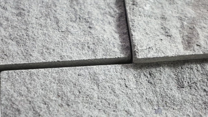 Video featuring Rockmount Mountain Bluestone 6X24 Stacked Stone Panel Splitface Sandstone. A rich blue-gray sandstone stacked stone panel with a natural, rugged texture.