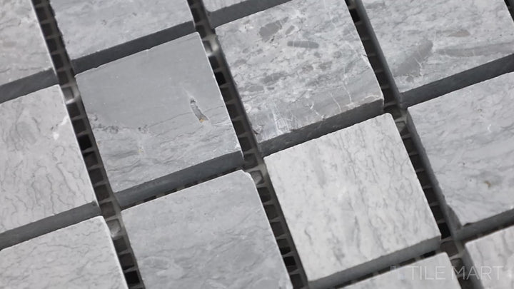 Video of Sto-Re Wooden Blue 1-1/8" Square Polished Marble Mosaic. A distinctive Wooden Blue marble mosaic with a polished surface, designed in small squares for a unique visual effect.