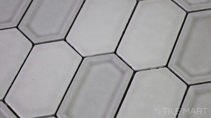 Video showcasing Foundations Pewter Framework Inverted Bevel Glossy Ceramic Mosaic. A sleek and modern ceramic mosaic with a glossy finish, featuring a beveled design for added depth and elegance.
