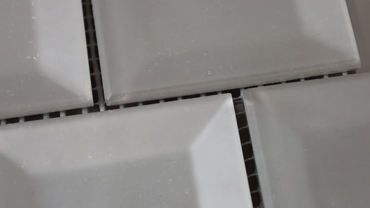 Video highlighting Prism Diamonds And Pearls Rectangle Matte Glass Mosaic. A pearlescent, refined glass tile with a subtle matte finish, perfect for a glamorous look.