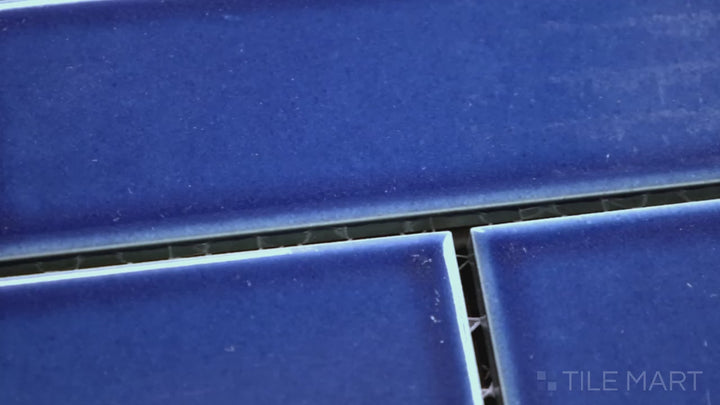 Video showcasing Zenia Tide Rectangle Gloss Glazed Porcelain Mosaic. A striking blue glossy mosaic, mirroring ocean waves for a serene, coastal vibe.