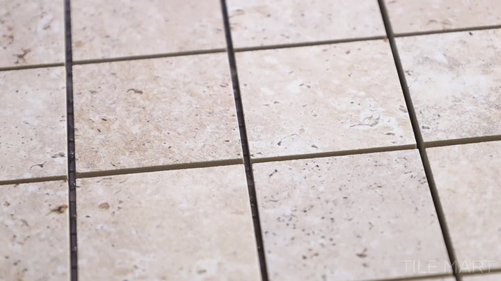 Video featuring Astrum Ivory 2" Square Matte Porcelain Mosaic. A warm-toned mosaic with a subtle matte texture, great for showers and decorative walls.