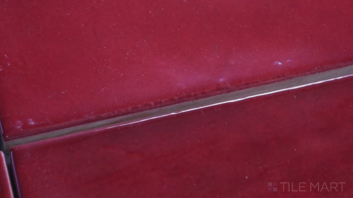 Video highlighting Village Volcanic Red 5X5 Glossy Ceramic. A fiery red square tile with a glossy finish, perfect for bold, energetic spaces.