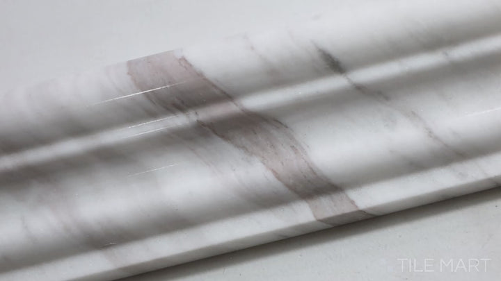 Video showcasing Sto-Re Volakas 2.5X12 Polished Marble Chair Rail. A Volakas marble chair rail tile with a polished finish, providing a sophisticated trim.