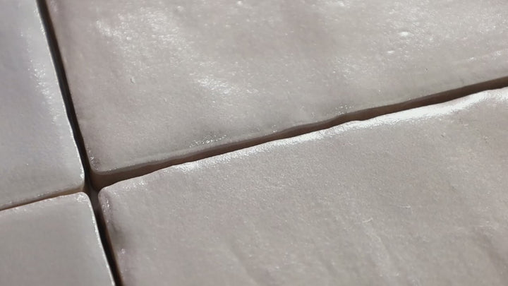 Video showcasing Mallorca Cream 4x4 Matte Ceramic. A warm cream-colored matte ceramic tile, offering a soft and neutral aesthetic.