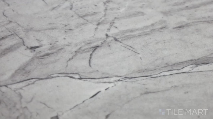 Video showcasing Kaya Onda Gray 12X24 Matte Porcelain. A contemporary gray wave-textured porcelain tile with a subtle matte surface for a modern touch.